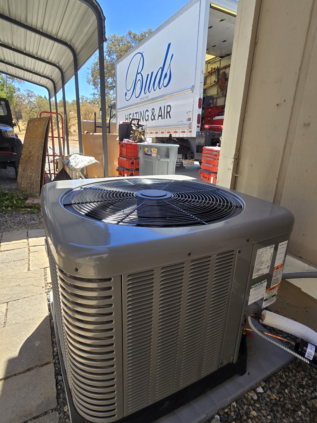 Buds Heating and Air truck with newly installed condenser unit