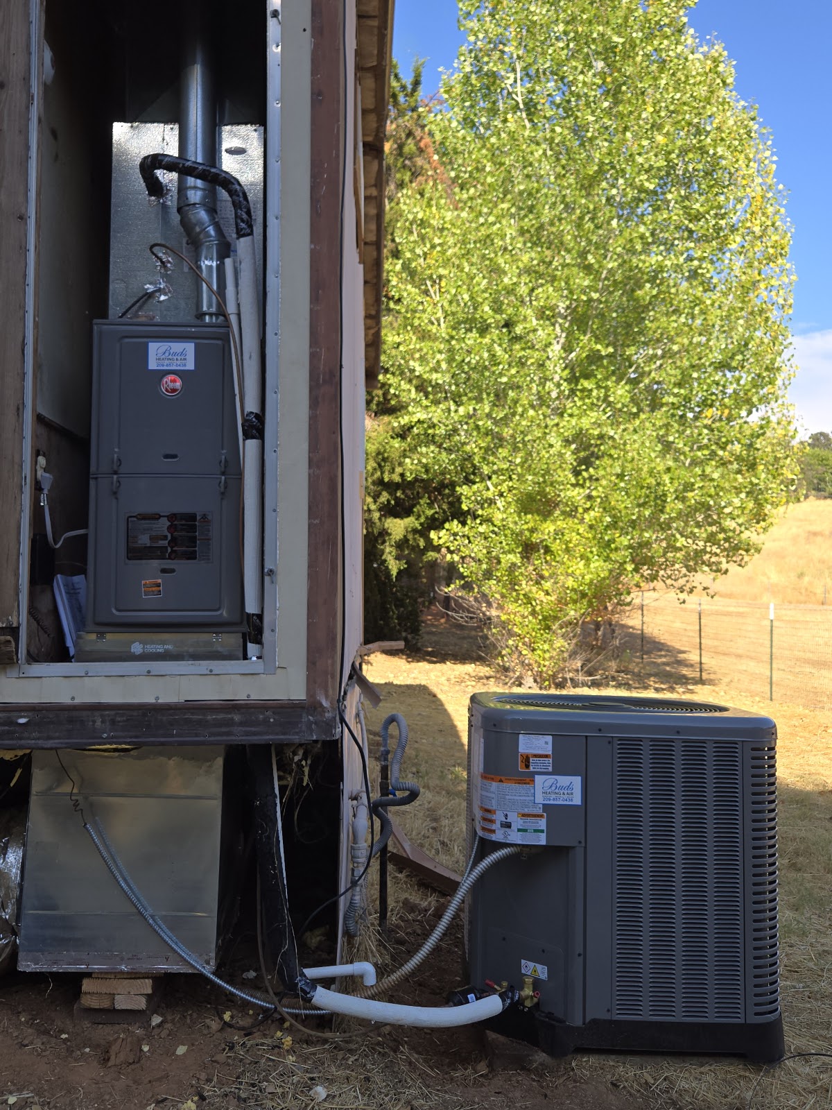 Rheem furnace and condenser installation by Buds Heating and Air in a rural Sierra Foothills setting